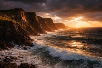 Fototapeta premium Sunset lighting on dramatic seaside cliffs and rolling ocean waves beneath overcast skies