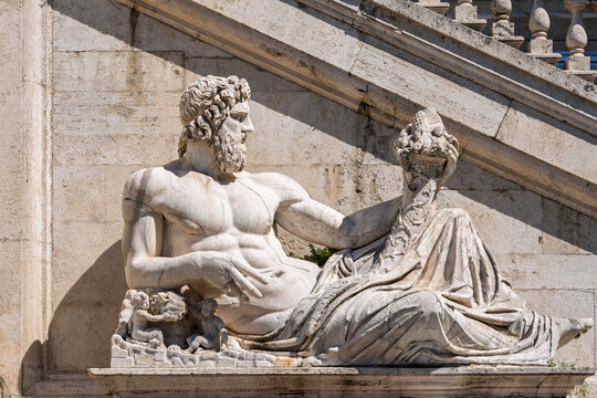 Italy - Rome - Piazza del Campidoglio - Statue of Tiber river god reclining marble sculpture on Capitoline Hill neoclassical art
