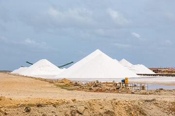 Industrial salt mining facility with large salt piles