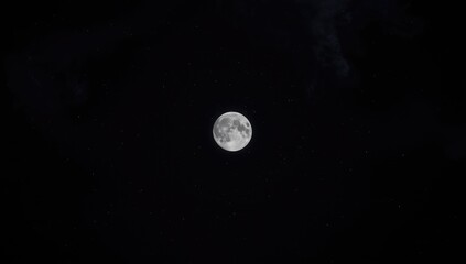 Waxing Gibbous Moon against a starry night sky, celestial event observation