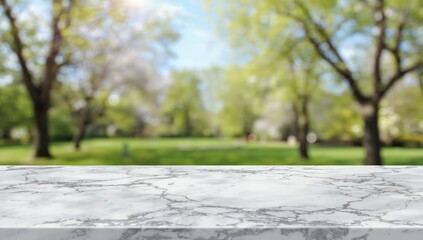 Empty white marble surface with soft park greenery and out-of-focus light effects, ideal for UI backdrop or banner template