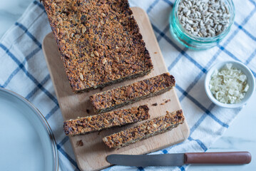 Sliced gluten free ​​bread on a board