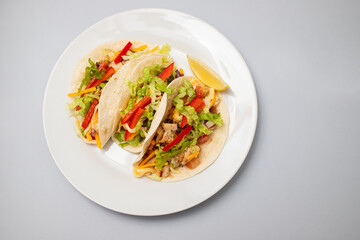 tacos with meat and vegetables - Mexican food style