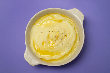 Mashed potatoes in white bowl