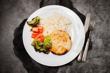 chicken burger with rice and salad