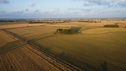 Obraz premium High-altitude image of extensive ranch terrain serving as an editorial header background