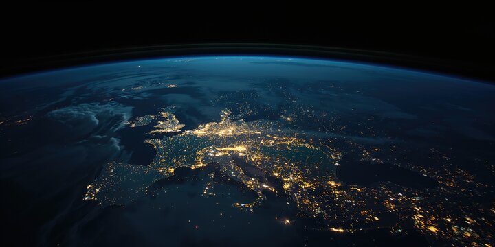 Nighttime satellite image of Europe showing illuminated cities, highlighting urbanization and regional connectivity, Earth Day