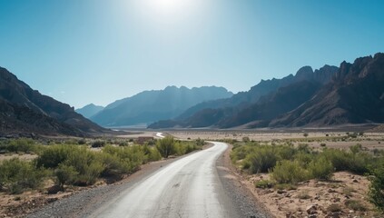Dades valley landscape in Morocco with mountain scenery, open road, and summer sky, nature travel destination