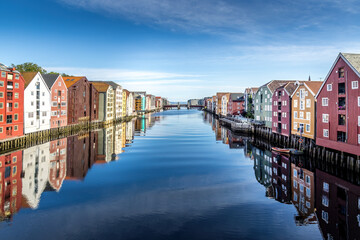 Colorful houses in old downtown of Trondheim, along a river