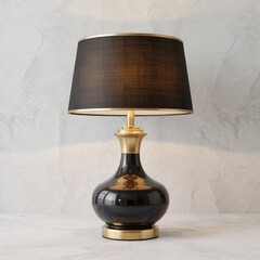 Black and gold table lamp with textured lampshade on marble surface black lamp gold lamp