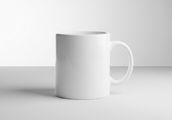 Obraz premium Minimal white ceramic mug mockup with soft gradient studio background lighting