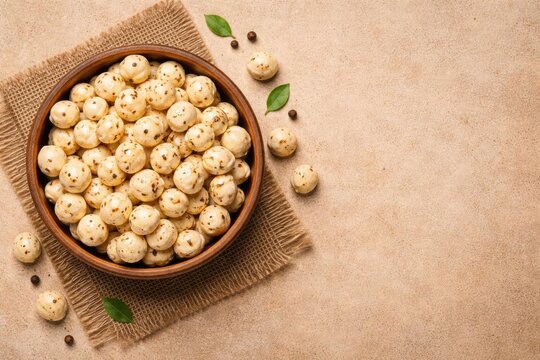 Top shot of tasty organic Makhana in wooden bowl with copy space for text