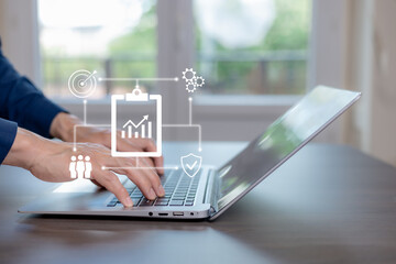 Business analytics and performance management concept with data dashboard, growth chart, and security icons. Professional working on laptop analyzing metrics, KPI tracking, strategic planning, and sec