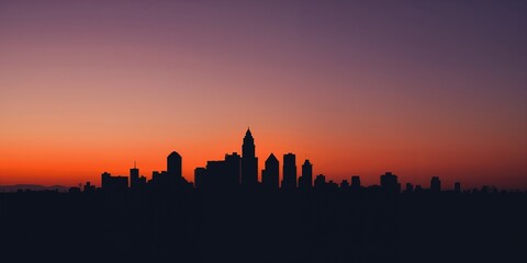 Silhouetted city skyline with shadowed buildings against a bright sky, urban density, sunset scene