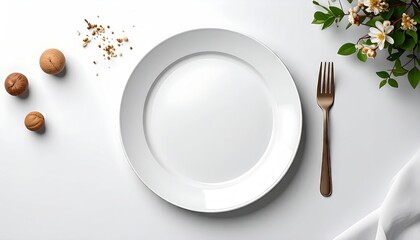 Plate, fork, and food arranged on white surface for food concept