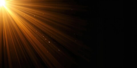 Isolated warm sun rays on black background used for overlay design, background for text and layout