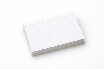 Lined notecards stacked on an evenly lit white background with copy space