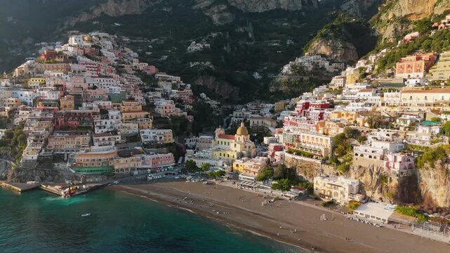 Positano on the Amalfi Coast in southern Italy, colorful cliffside houses above the Tyrrhenian Sea creating iconic Mediterranean travel destination. Aerial View reveals dramatic coastal landscape