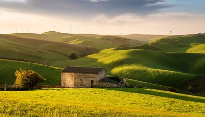 old stone farmhouse nestled in rolling green hills bathed in warm golden light