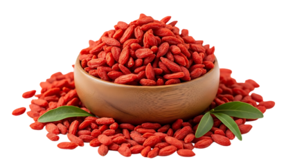 Bowl of bright red goji berries surrounded by scattered berries and green leaves on dark background isolated on a transparent background