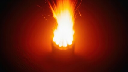 Vibrant fire burning brightly in a dark environment with sparks flying around