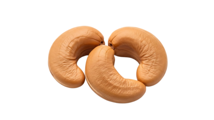 Two Fresh Light Brown Cashew Nuts with Smooth Curved Shapes Close Up View isolated on a transparent background