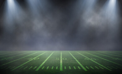 green field in american football stadium. ready for game in the midfield
