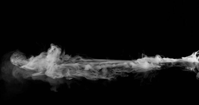 Super Slow Motion of White Surface Smoke Texture Isolated on Black Background. Filmed on High Speed Cinema Camera, 500fps. VFX element for overlay.