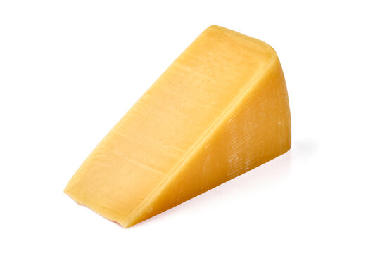 Wedge of cheddar cheese, isolated on white background