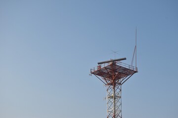 radar and sonar on tower rooftop at Rayong estuary or mouth of river travel location in Thailand   