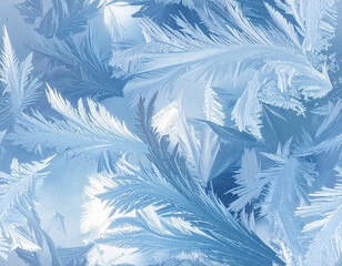 Close-up of delicate ice crystal formations on a windowpane with intricate fern-like patterns and a soft blue background.