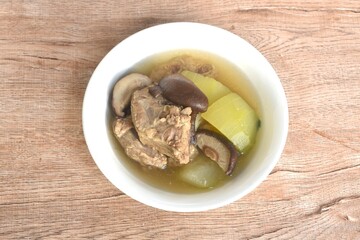 boiled winter melon with pork bone and black mushroom soup on bowl