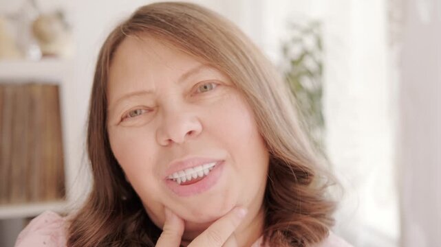 Dental retainers, Positive aging photography showcasing mature woman's genuine happiness and excellent oral health through natural, long-term teeth retention