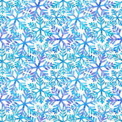 Fototapeta premium Watercolor snowflakes seamless pattern. Abstract hand painted winter print. Monochrome blue snowflakes. Frosty design for seasonal textile, fabric, packaging