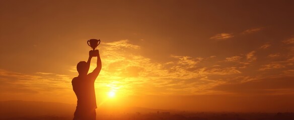 The trophy held aloft by a triumphant silhouette against a golden sunrise sky