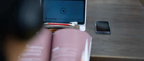 E-learning online education training webinar on internet for personal development and professional qualifications. Digital courses to develop new skills. Concept with student using computer.