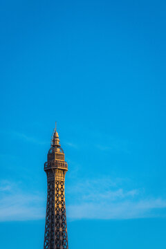 View of a tower against a backdrop of clear azure sky, a symphony of geometric precision and open space, Las Vegas, Nevada, United States.