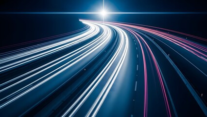 Traffic light trails on a dark highway at night