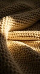 Soft, golden sunlight bathes a plush, creamy knit blanket, creating a cozy texture and deep shadows with ample open space for design integration, creamy, peaceful, surface