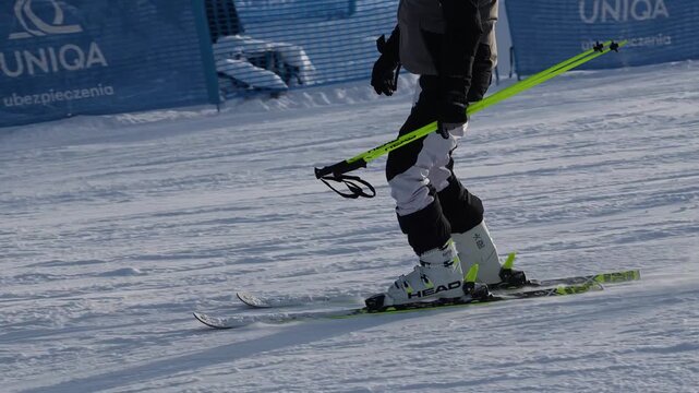 Skiing techniques on slopes with winter sports enthusiasts