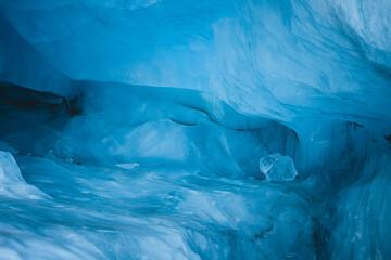 View of the cool blue ice cave with its smooth, swirling textures and crystalline formations, a frozen wonderland of geological artistry, VatnajÃ¶kull National Park, South Iceland, Iceland.