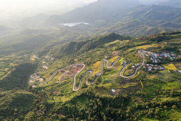 Aerial view of the famous winding S-curve road at Phu Thap Boek mountain, Phetchabun, Thailand.