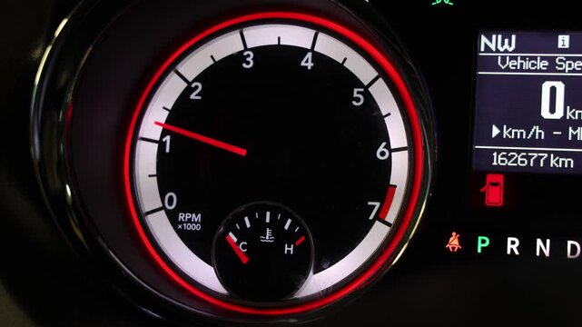 Close up on a car tachometer