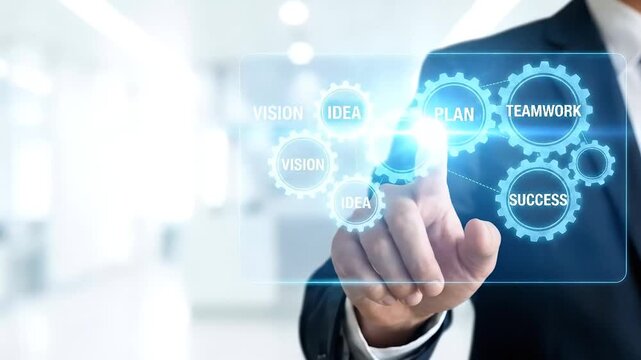 Businessman using interactive touch screen with cogwheel icons representing business concepts for success