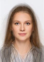 morphed photo as AI learns concept - average face of a woman