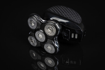 Modern electric head shaver. Premium men's grooming device for bald head maintenance and personal care routine