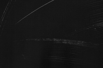 grunge overlay effect with scratch and dust on black background,black paper background with scratch...