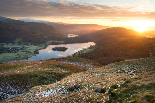 Golden sunrise over Grasmere and Rydal Water on a beautiful winter morning, Lake District, UK.