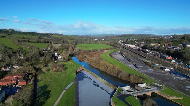 Exeter, South Devon, England: DRONE VIEWS: The Exeter Ship Canal frozen by cold weather; a lock on the River Exe and the railway line. Exeter is the county town of Devon.