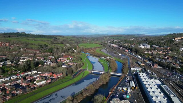 Exeter, South Devon, England: DRONE VIEWS: The Exeter Ship Canal frozen by cold weather; the River Exe; the railway line into Exeter St David's train station. Exeter is the county town of Devon.